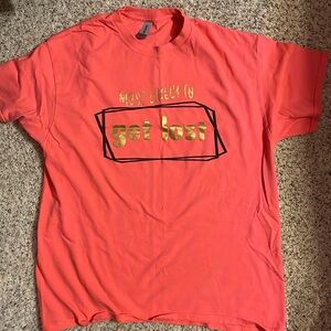 Coral t-shirt with gold lettering
